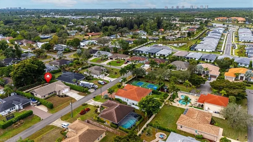 Aerial overview of property's location with nearby suburban area and nearby urban area
