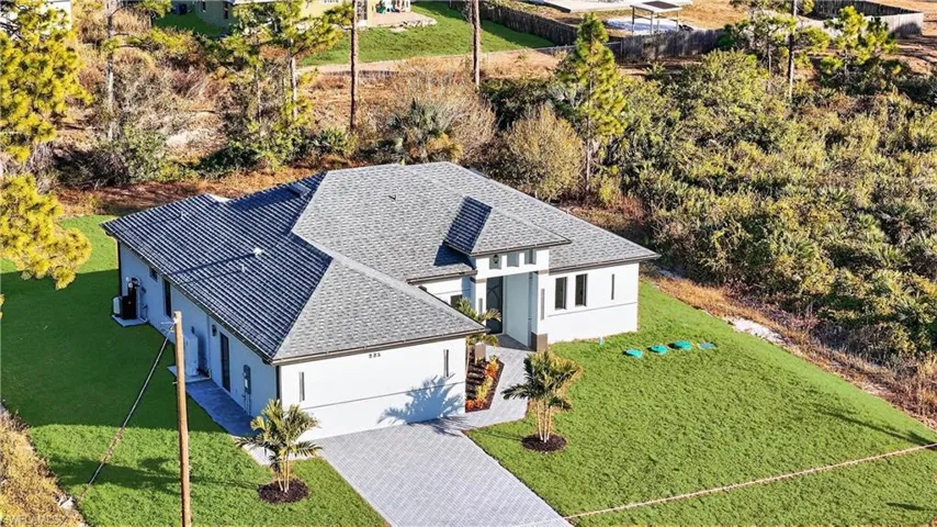 Aerial view of property and surrounding area