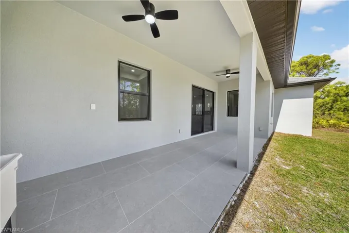 View of patio featuring ceiling fan and outdoor lounge area