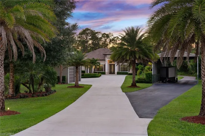 View of front of house with a yard