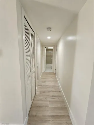 Hall with light wood-type flooring