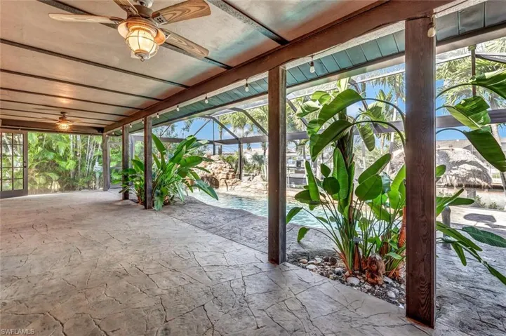 View of patio featuring ceiling fan
