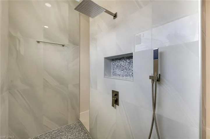 Bathroom with tiled shower