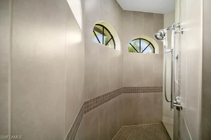 Interior details featuring tiled shower