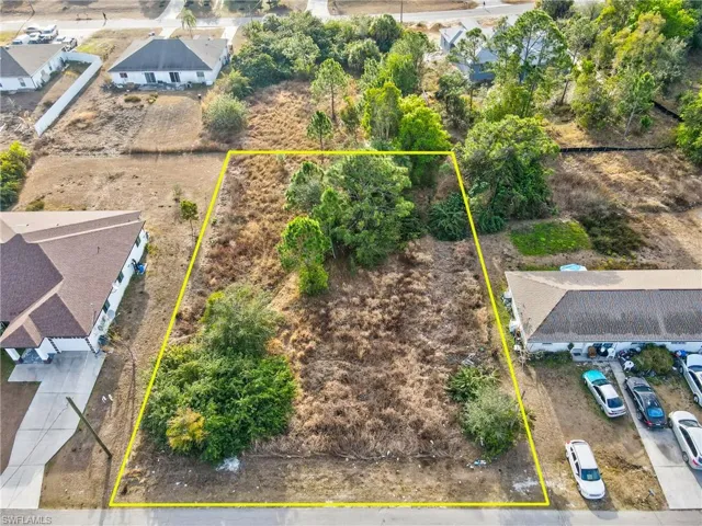 Aerial view of property's location featuring property parcel outlined