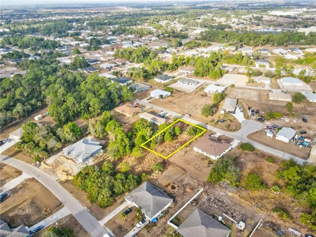 View of property location with property parcel outlined and nearby suburban area