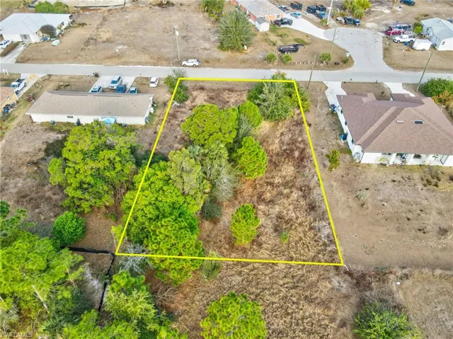Aerial view of property's location featuring property parcel outlined