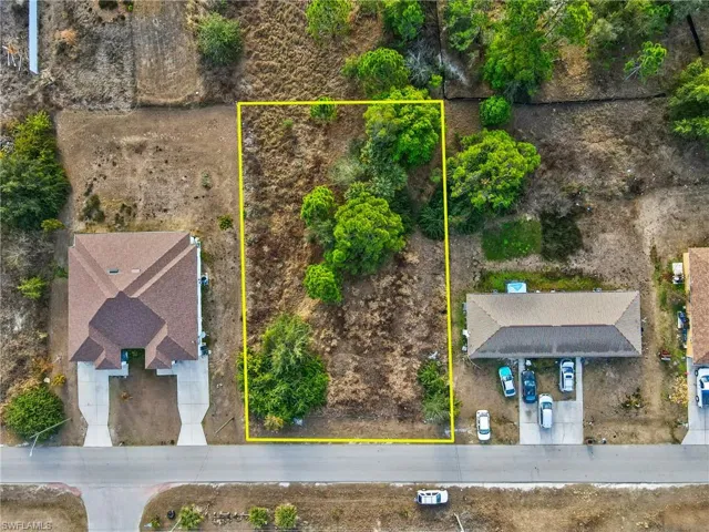 Aerial overview of property's location with property parcel outlined