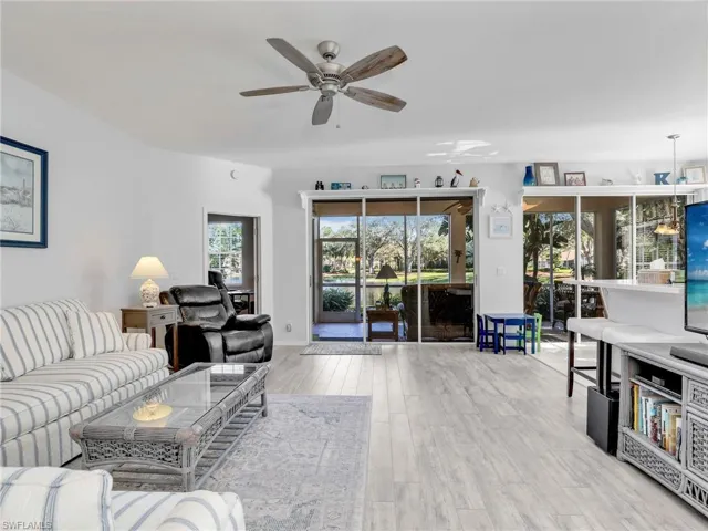 Living Room with Sliders to Lanai & Ceiling Fan
