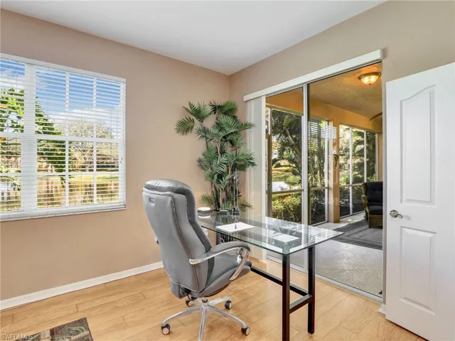 Primary Bedroom Showing Sliders To Lanai