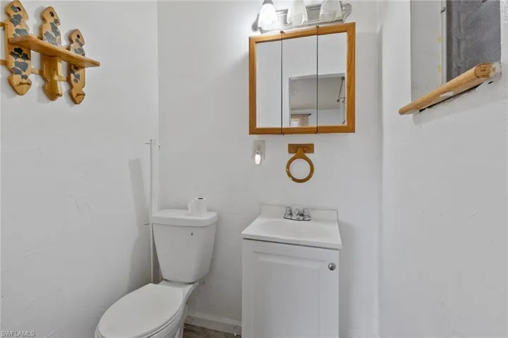 Bathroom with vanity and toilet