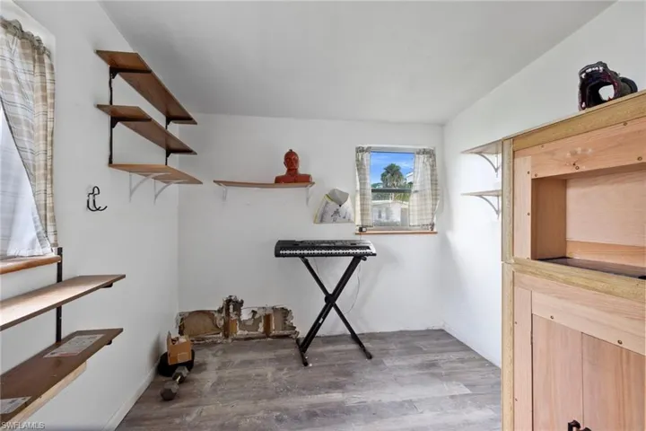 Spacious closet with wood-type flooring