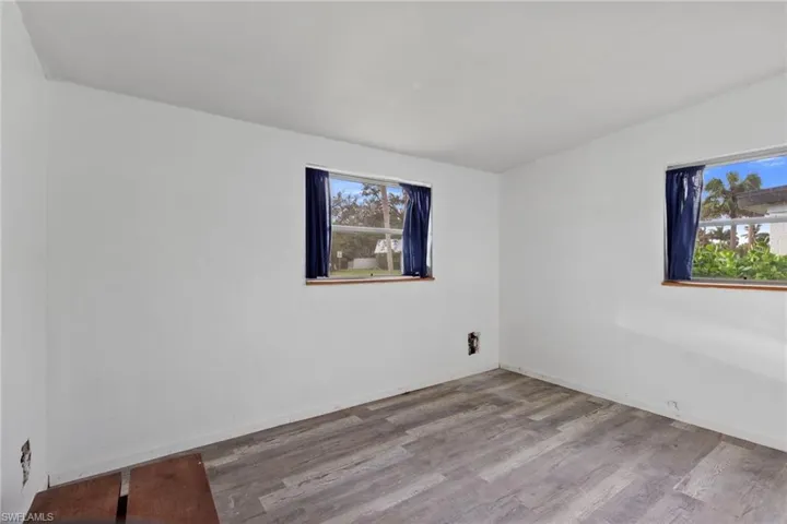 Spare room with light wood-type flooring