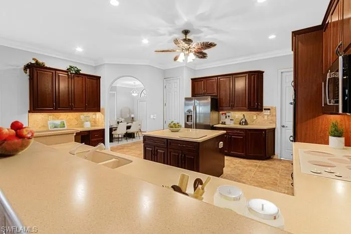 Digitally staged kitchen - entire home was just painted white inside (3/17/24)