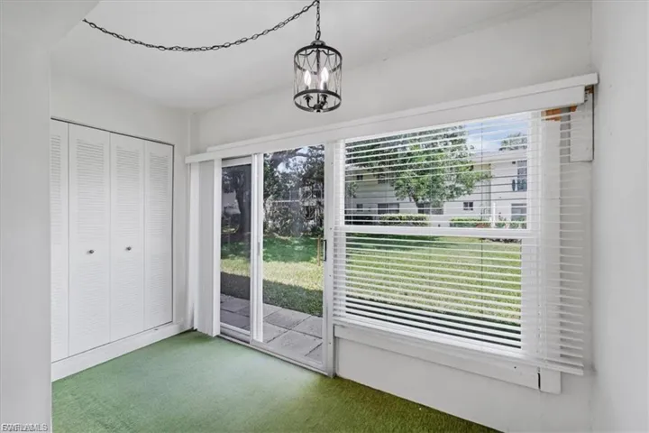 Entryway featuring carpet