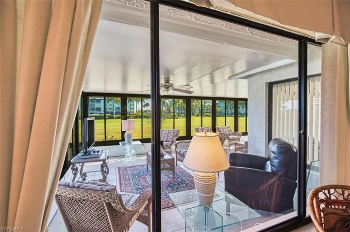 Sunroom with tile patterned flooring