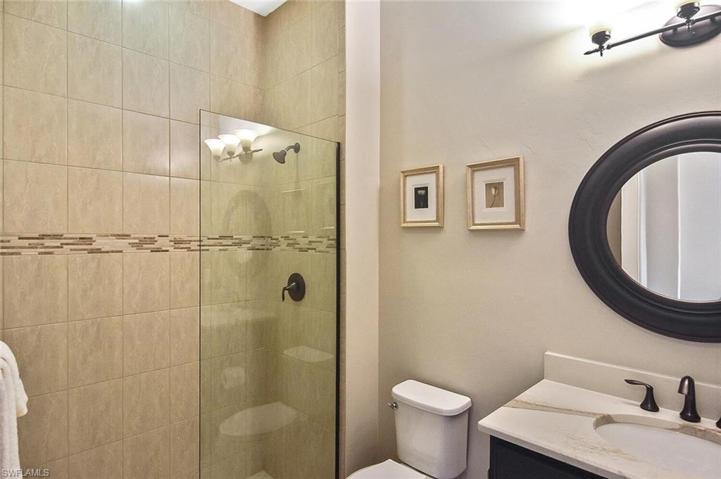 Guest Bath with frameless glass enclosure