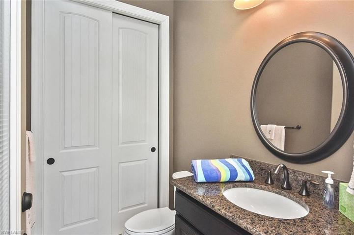 The outside bathroom with storage
