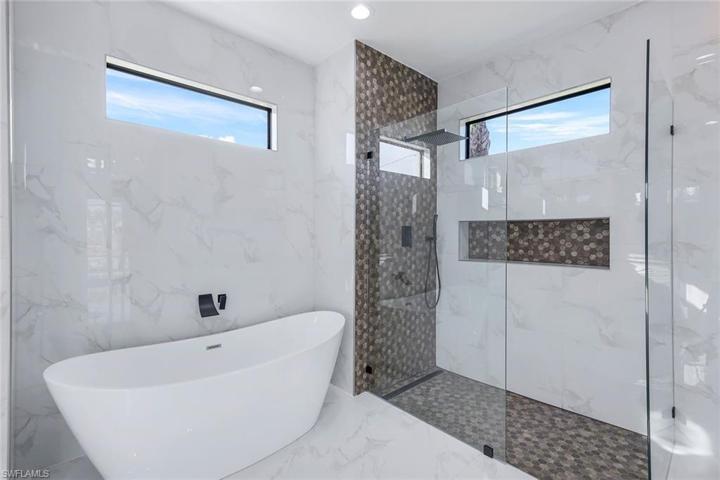 Separate tub and shower in master bathroom