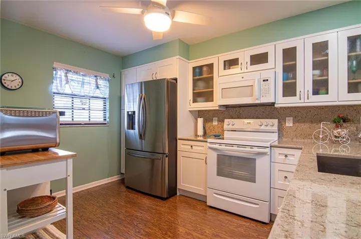 This lovely updated kitchen is light and bright !