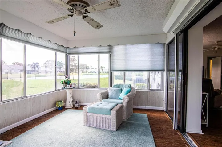 Sunroom with a wealth of natural light and relaxing LAKE VIEWS!