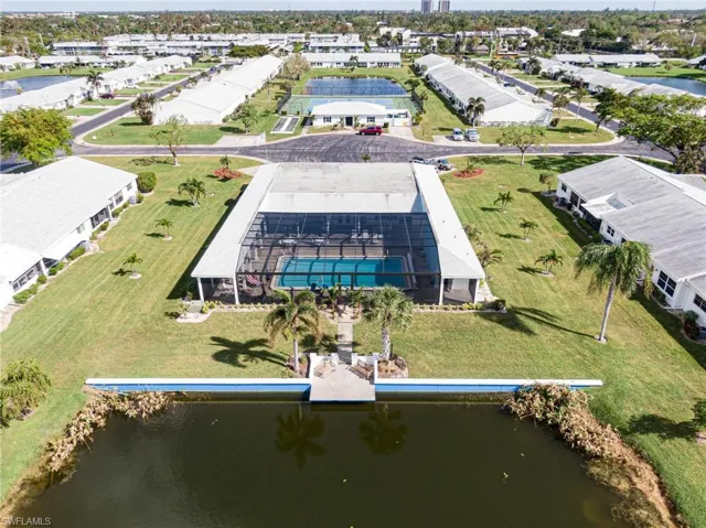 Aerial view of COMMUNITY CENTER with a water view