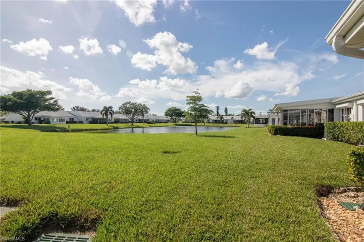 View of the backyard with a beautiful Lakeview!