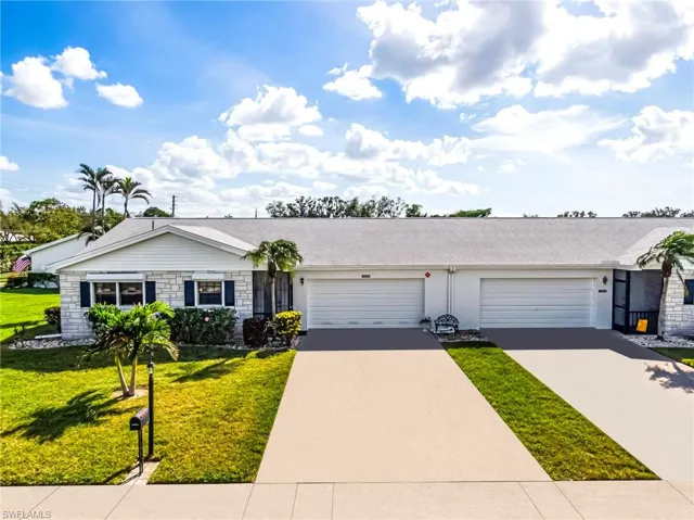 Ranch-style Villa featuring a large 2 car garage and a front yard!