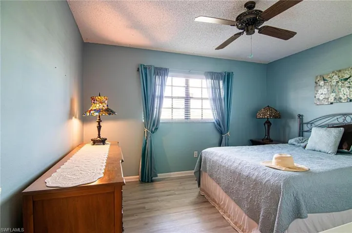 Guest Bedroom 1 features newer Luxury Vinyl flooring and lots of closet space!
