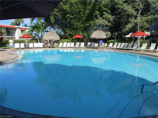 Community pool featuring a patio area