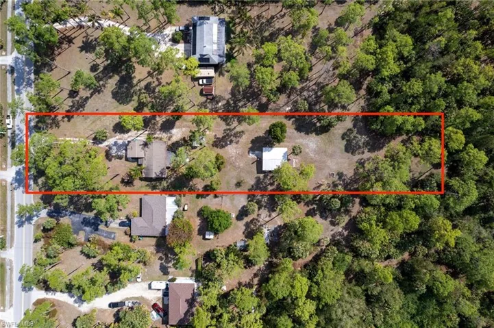 Aerial view of property's location with property parcel outlined