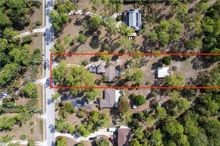Aerial view of property's location featuring property parcel outlined
