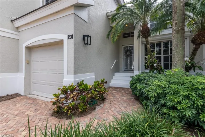 Covered entry for your guests, attached garage access for yourself.