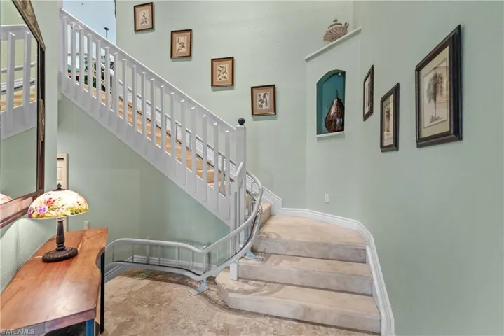 Upstairs, to great light and high ceilings!