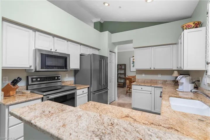 Beautiful stainless appliances and cabinetry.
