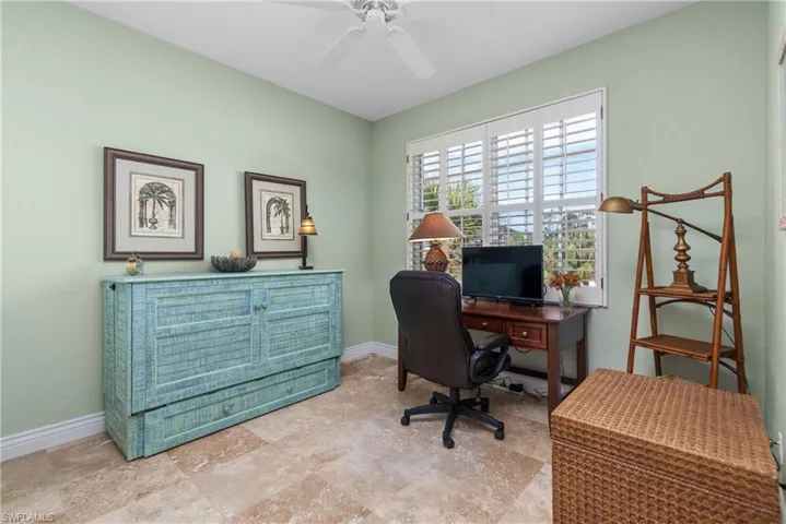 Guest BR with Murphy bed, desk, and great light.