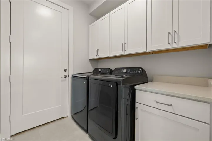 Laundry Room with built-in cabinets