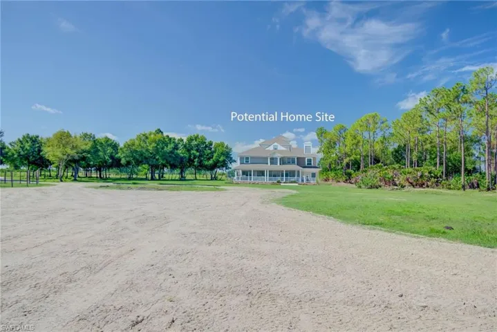 View of green lawn featuring exterior structure and an outbuilding CHICKEN COOP