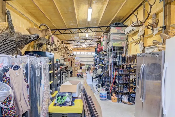 1000 SQ FT SPRAY FOAM INSULATED, PLUMBED, AND AIRCONDITIONED with stainless steel fridge with ice dispenser AND HOOK UP FOR WASHER AND DRYER