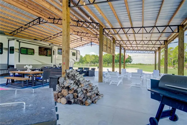 BARN featuring an outdoor living space, outdoor dining space, and a patio