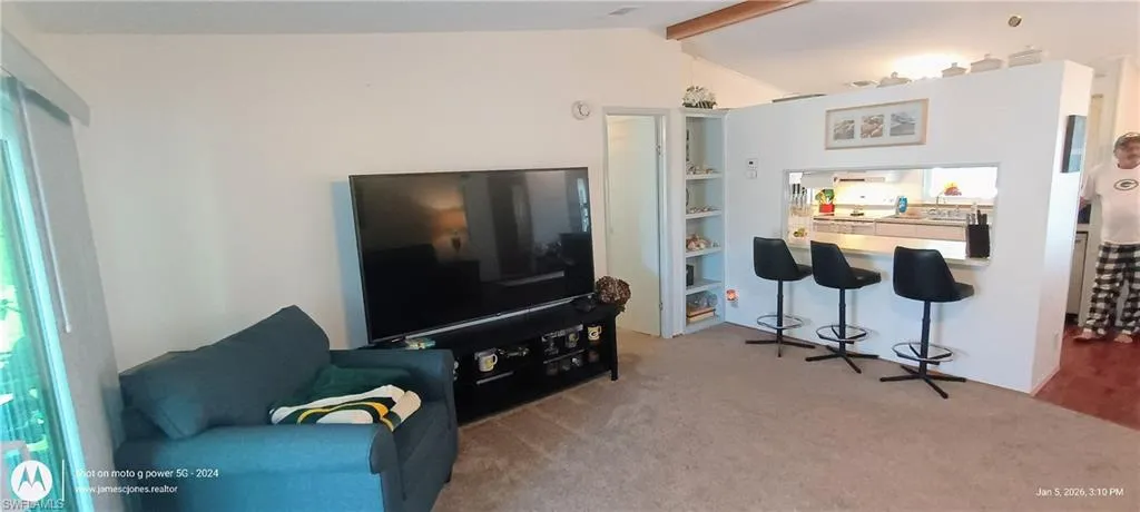 View of carpeted living area