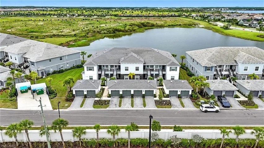 Aerial view of residential area with a large body of water