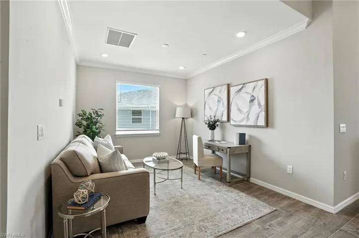 Home office with crown molding, wood finish floors, and recessed lighting