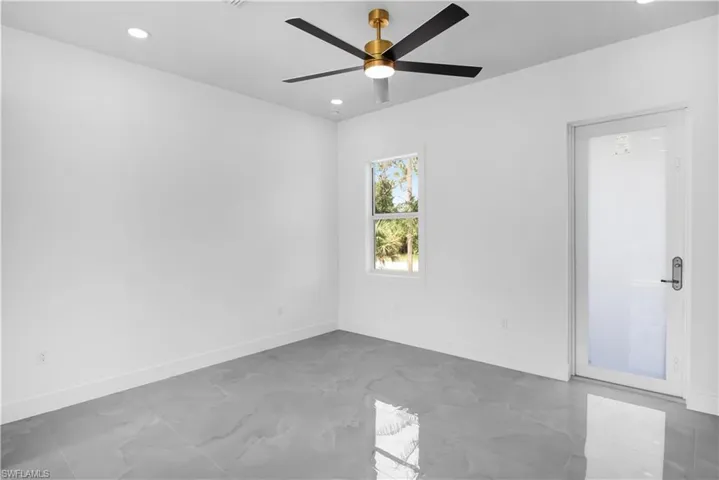 Unfurnished room with recessed lighting and ceiling fan
