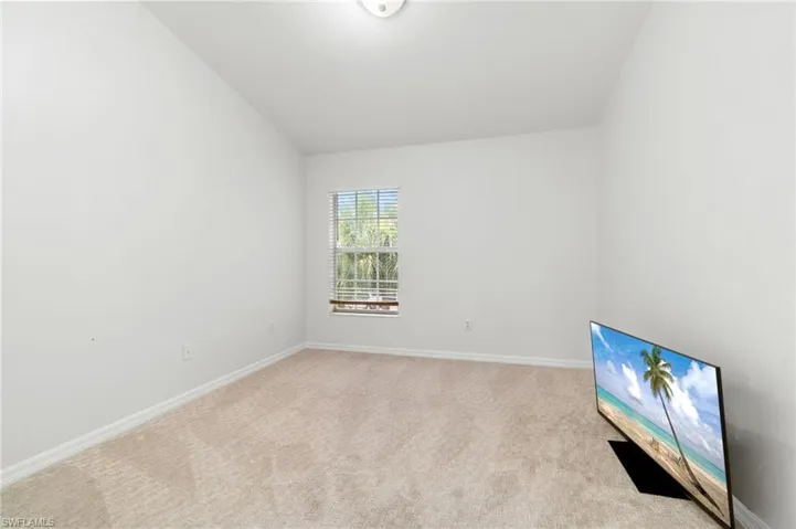 Guest bedroom 2 with vaulted ceiling