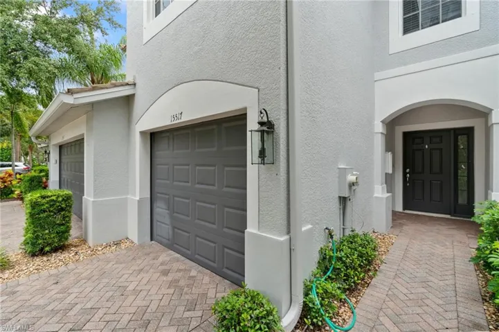 Entrance to property with a garage