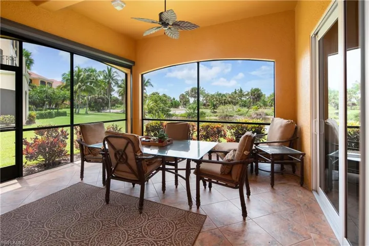 Sunroom / solarium with ceiling fan and a wealth of natural light
