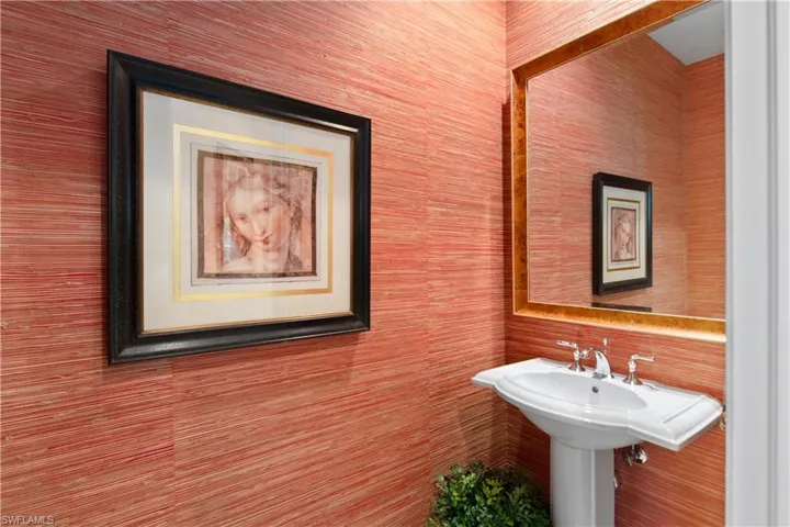 Bathroom featuring tile walls