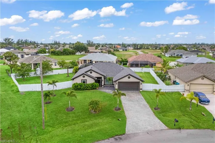 This isn't just a home—it's a statement, sitting proudly on one of the largest lots in the area.