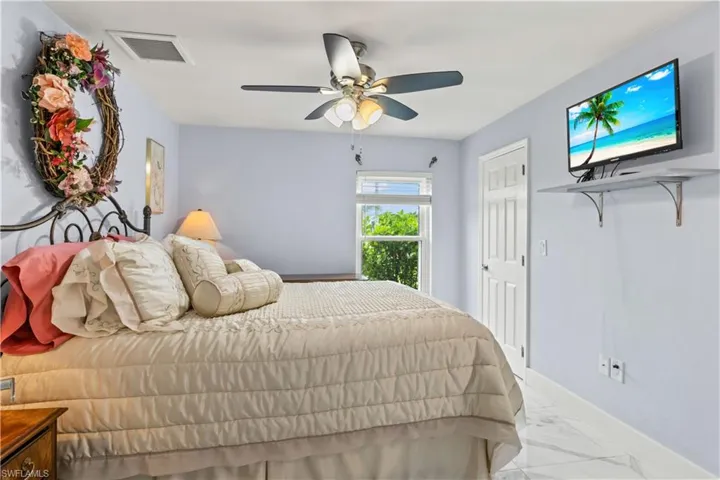 Spacious guest rooms with neutral tones and lots of natural light.